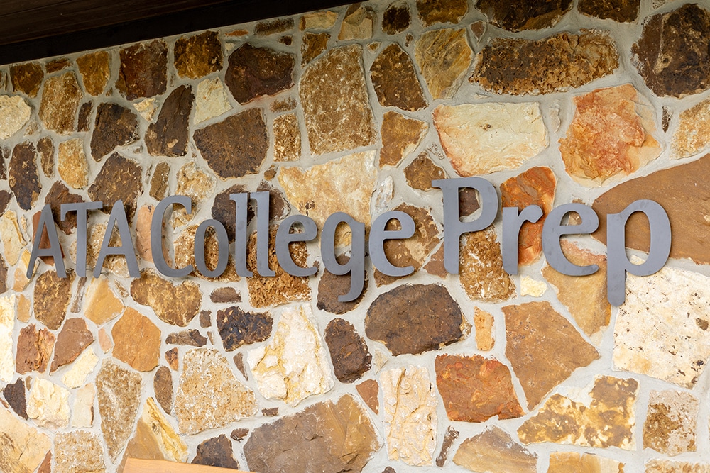ATA College Prep school sign on stone wall